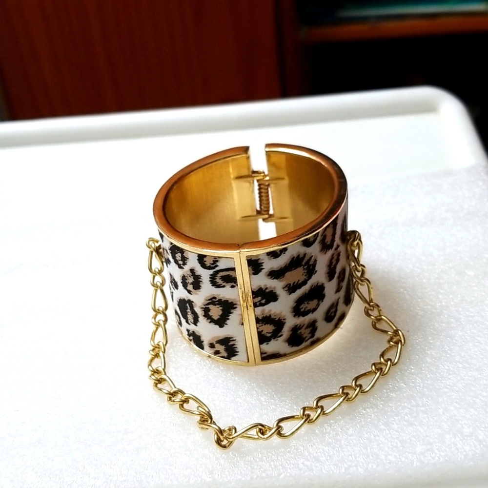 Animal fabric print goldtone clamp bracelet with safety chain